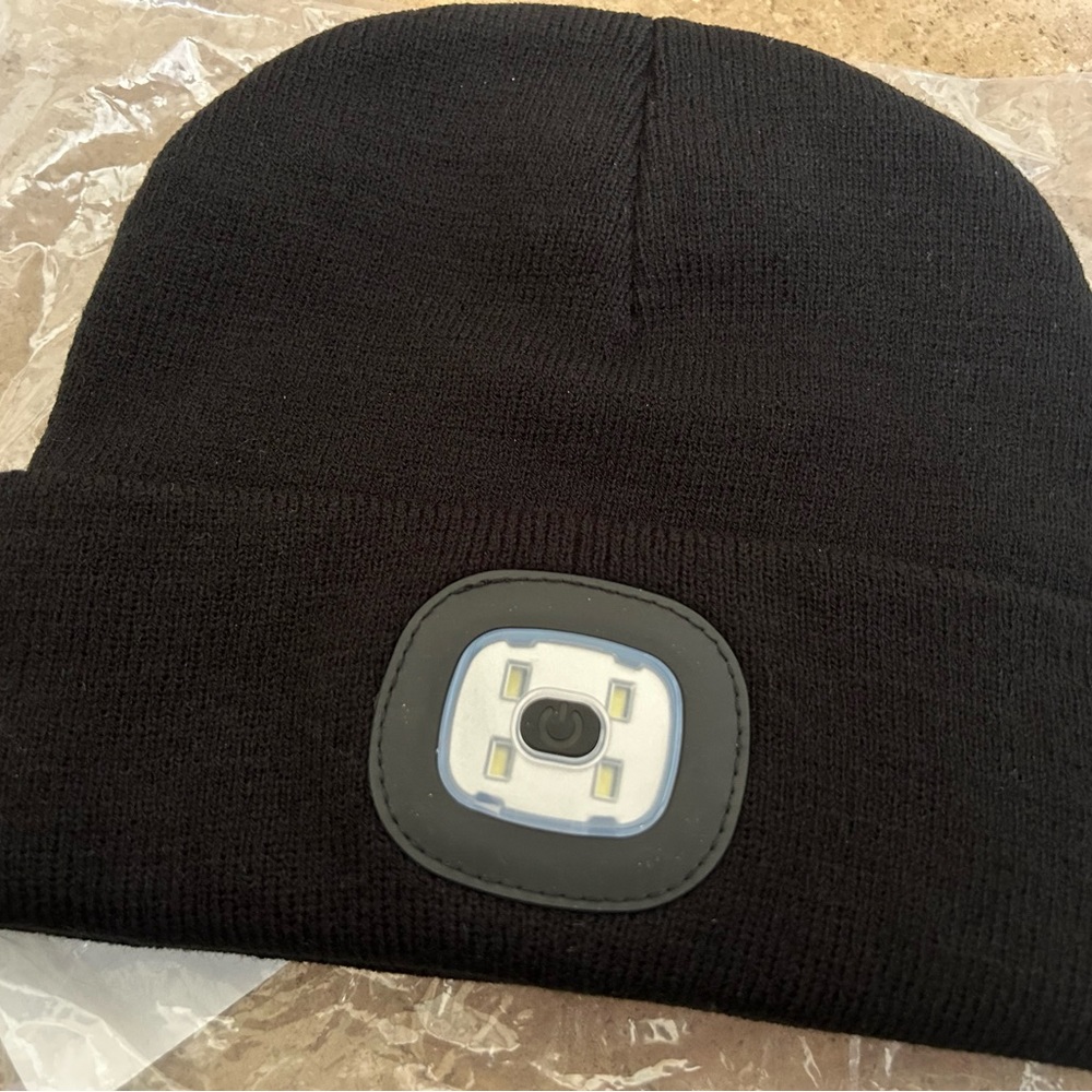 Black knit beanie hat with LED light
